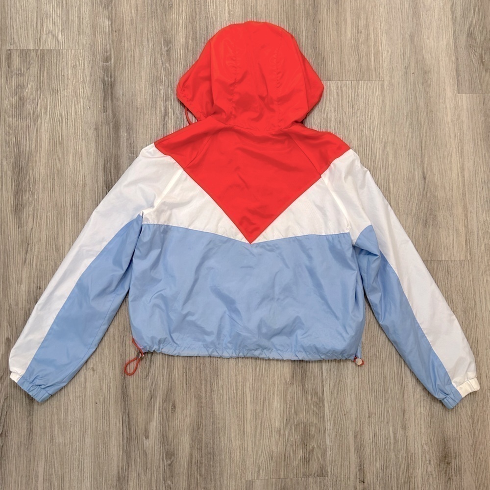 Lightweight women’s hooded jacket coat with drawstrings around bottom hem. - Picture 2 of 5